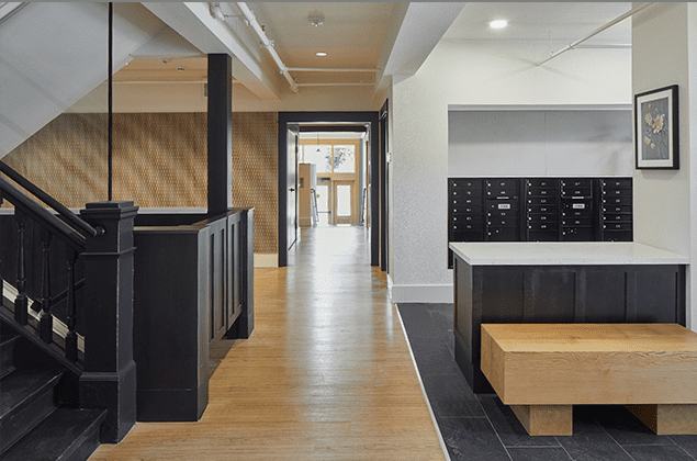 Interior view of the Rose Apartments lobby after construction. 